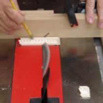 Tablesaw with pencil to hold molding